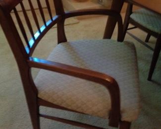 two Captain's chairs with drop seats