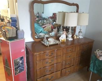 12 Drawer Dresser with matching Mirror. Antique Ceramic Lamps, quantity of 2 matching, small square Vanity Dresser Mirror, Powder Puff, Perfume Bottle Holder. Tall Christmas Tree in a Planter. 