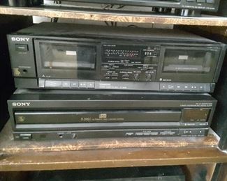 Sony Tape Cassette Player Deck (2 Deck Places On Top), Sony CD/DVD 5 Disc Player Automatic Loading System (On Bottom).