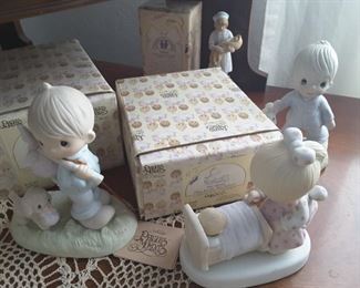 Precious Moments Collectibles with matching boxes.