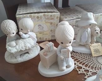 Precious Moments Collectibles with matching boxes.