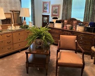 Two of several vintage dressers; arm chair;side table