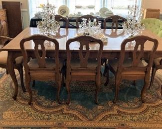 One of two lovely dining tables (8 chairs)
