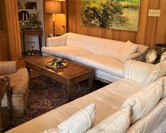 Two of the three large sofas in the den