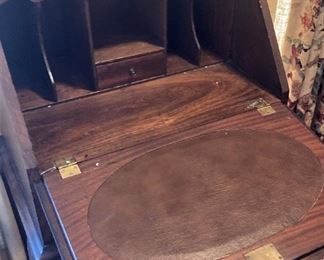 .  .  .  with leather writing bed