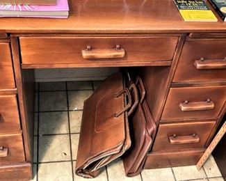Another desk; leather briefcases