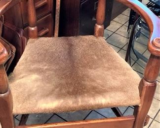 Old office chair with hide-seat