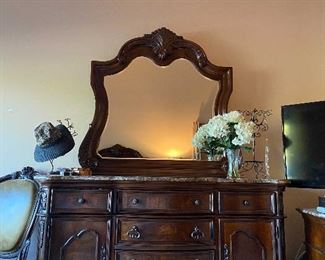 Walnut Wood Dresser with Marble Top and  Mirror     Dresser measures approximately  38" H x 68" W x 19" D  Mirror measures approximately 48"H x 50" W x 3.5" D