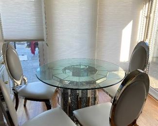 Dining Set with Glass Table Top and 4 Chairs
Table measures approximately 48"    Chairs measures approximately 45.5" H x 22" W x 27" D