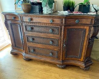 Ornate Wood Sideboard. 
Measures approximately 40" H x 75" W x 22" D