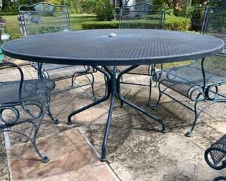  Woodard"Briarwood" wrought iron table & 6 spring coil chairs                table 54" diameter
