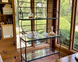Was $350.00 Now $175.00  Wrought iron and glass etagere                                                       72"h x 44"w x 18"d                                                                        (crystal will be sold at the main sale in October)
