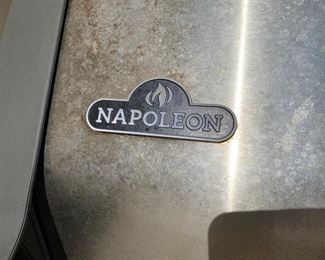  Napoleon natural gas grill - 2 years old  - comes with motorized rotisserie                                                          (available for pickup mid-October)                                        wear to writing under knobs