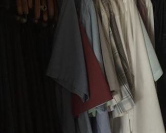 Several closets of men’s clothing. 