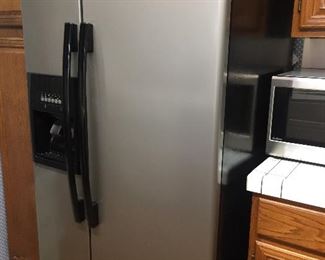Smudge less stainless steel refrigerator. Water and ice in the door. Clean and in great condition.