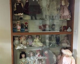 Doll wigs and stands.