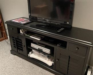 Pottery Barn black console/entertainment unit (30" x 64" x 18") $400 and Sony TV 31" $50