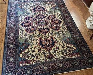 hand-made 100% wool rug with hand-tied fringe (76" x 52.5") $350