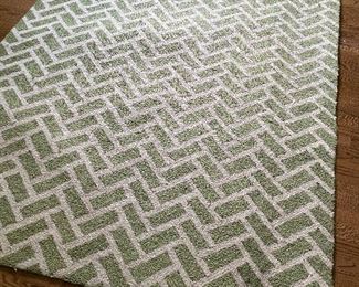 Green and white chevron patterned rug $25