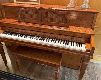 Baldwin upright piano with bench seat (# 1468813) $650