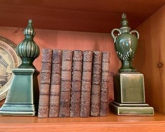 Leather books (set) $20, Green ceramic pedestals set $30
