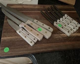 Chicago cutlery knife set $75, steak knives $25 and cutting board $10
