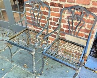 $195 each - 8 Wrought iron arm chairs, #1 and #2; 37.5"H x 21"W x 19"D. Height to seat is approx. 18"