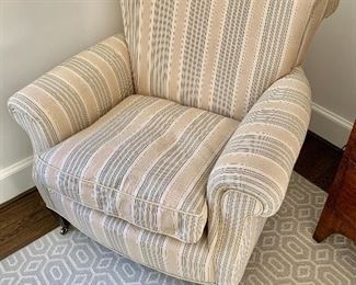 $295 - Custom upholstered arm chair with down cushion and casters; 32"H x 32.5"W x 33"D. Height to seat is approx. 17.5"