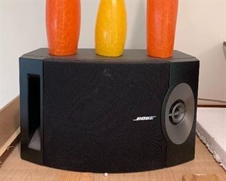 Pair of Bose 201V speakers and candles