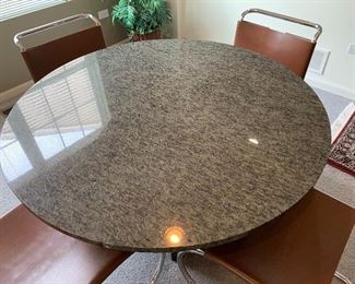 Granite kitchen/dining table  w/black legs 4' round (chairs NFS)