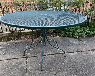 green wrought iron patio table