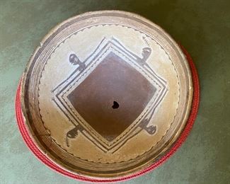 Native American pottery bowl with kill hole                           4 1/2"h x 9 1/2" diameter