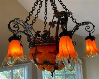 Stunning Blown Glass & Wrought Iron Chandelier available for presale. Call Mimi @ 562-254-2597 for details.
