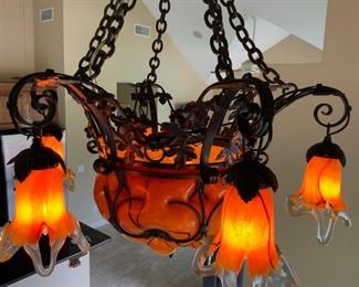 Stunning Blown Glass & Wrought Iron Chandelier available for presale. Call Mimi @ 562-254-2597 for details.