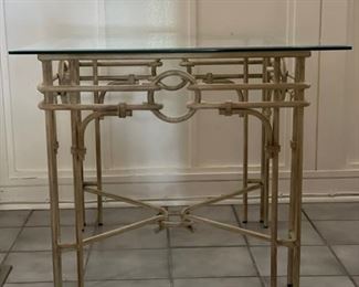 Wrought iron side table with glass top. Measures 26" x 26" x 21" H. Photo 1 of 2. 