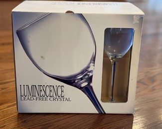 Luminescence lead-free crystal wine glasses with cobalt blue stems. 