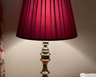 Brass table lamps with red shade. Each measures 32" H. 