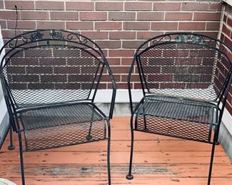 Set of 4 metal barrel-back outdoor chairs (2 shown) with cushions. Photo 1 of 3. 