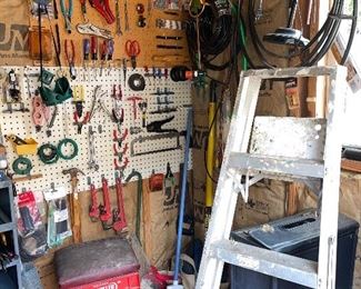 Milk crates, aluminum ladder, Pipe Wrenches