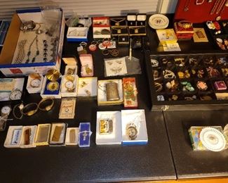 Watches, money clips, lighters and other items