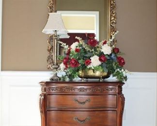 3 DRAWER DRESSER, DECORATIVE MIRROR, LAMP, FLORAL ARRANGEMENT