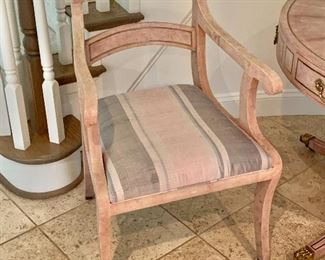 $900 - Pair of Maitland-Smith arm chairs - 35"H x 21.5"W x 18"D (seat height 19"H). Chair 1 of two  (seat has small stain on upholstery)
