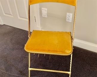 $40 each - Vintage folding chairs with velveteen seat and back.  Wear consistent with age and use.  31.5"H x 15"W x 18"D (seat height 17.5"H).  50 available.