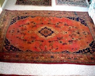 A hand knotted rug not sure of the provenance.