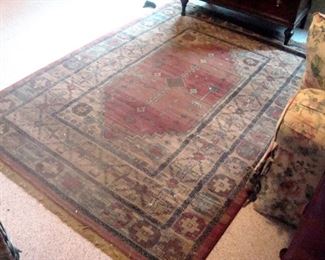 A mohawk machine made oriental style rug.