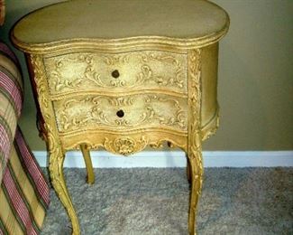One of a pair antique hand carved end tables