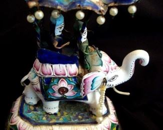 Antique Chinese enameled elephant with two riders.