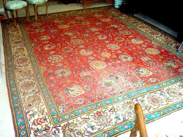 Antique Tabriz hand knotted wool rug, 12'7" by 9'7".