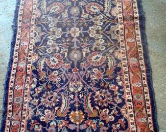 Hand knotted oriental Persian rug.