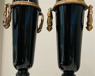 $90 Pair of black reproduction black porcelain decorative urns